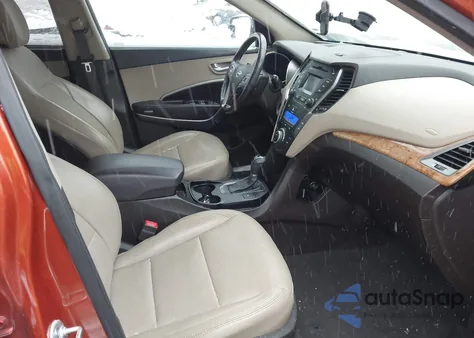 2015 Hyundai Santa Fe Sport 2.4L z USA, uszkodzony, nr VIN 5XYZUDLB8FG294511